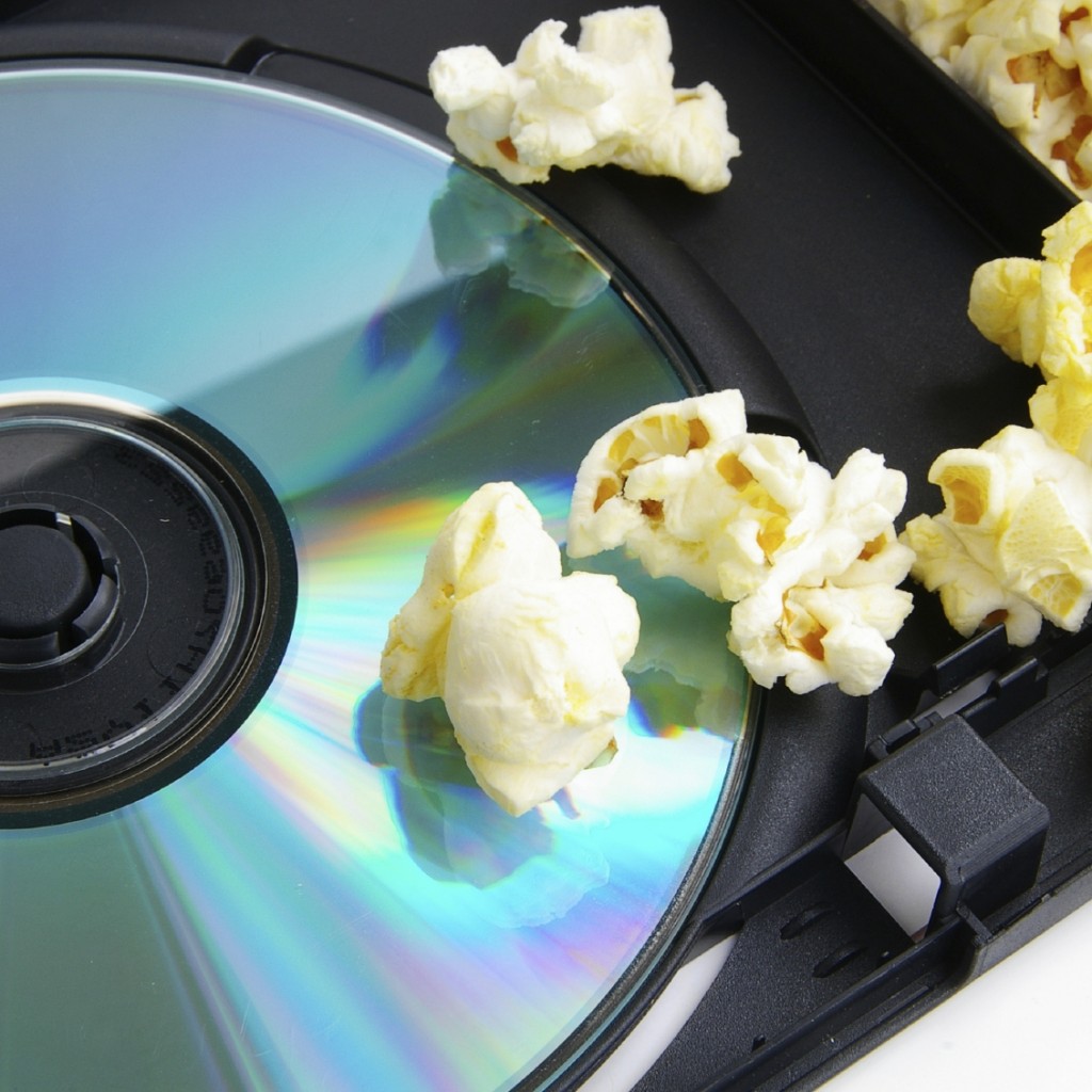 DVD or CD  and popcorn  closeup